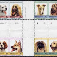 St Vincent - Bequia 1985 Dogs (Leaders of the World) set of 8 in se-tenant cross-gutter block (folded through gutters) from uncut archive proof sheets, some split perfs & wrinkles but a rare archive item unmounted mint