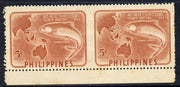 Philippines 1952 Indo-Pacific Fisheries 5c brown horizontal pair imperf between unmounted mint, listed as SG 744a but unpriced