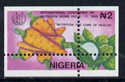 Nigeria 1992 Conference on Nutrition - 2N (Vegetables) unmounted mint with vert & horiz perfs misplaced (divided along margins so stamp is quartered)*