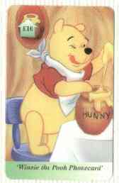 Telephone Card - Winnie the Pooh £10 'phone card #05 showing Pooh standing at table eating Hunny