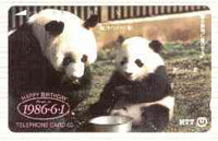 Telephone Card - Japan 50 units phone card showing Panda (TongTong) with mate & food bowl inscribed 'Born in 1986.6.1' (horiz card in colour) card number 230-082