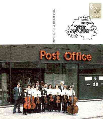 Postcard of Belfast Youth Orchestra outside Post Office (PO picture card NIPB 1) used with illustrated first day cancel