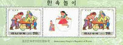 North Korea 1997 Children's Games (2nd series) 70ch (Arm Wrestling) perf m/sheet containing 2 stamps plus label