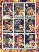 Tadjikistan 2001 Owls & Fungi perf sheetlet containing set of 9 values, each with Rotary Logo, unmounted mint