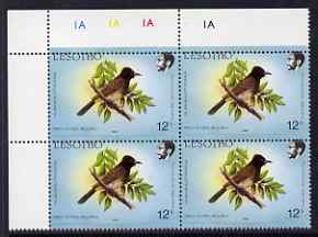 Lesotho 1988 Birds 12s Red-Eyed Bulbul with superb 2mm misplacement of horiz perfs SG 795var unmounted mint plate block of 4 from top of sheet showing perfs passing through Country name and part of the design in upper margin