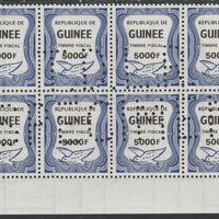 Guinea - Conakry 1987 Dove 5000f Revenue stamp in block of 8 showing complete perfin 'T.D.L.R. SPECIMEN' unmounted mint ex De La Rue archive sheet and rare thus