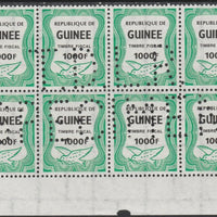 Guinea - Conakry 1987 Dove 1000f Revenue stamp in block of 8 showing complete perfin 'T.D.L.R. SPECIMEN' unmounted mint ex De La Rue archive sheet and rare thus