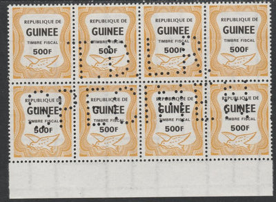 Guinea - Conakry 1987 Dove 500f Revenue stamp in block of 8 showing complete perfin 'T.D.L.R. SPECIMEN' unmounted mint ex De La Rue archive sheet and rare thus