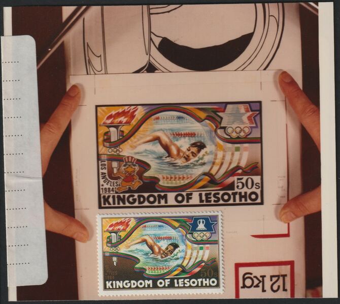 Lesotho 1984 Los Angeles Olympic Games coloured photograph of essay for 50s value showing Swimming with official label on reverse giving technical details and a note saying 'the man should be negroid' plus issued stamp SG 592