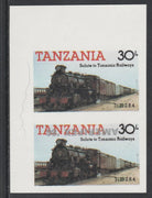 Tanzania 1986 Railways 30s (as SG 433) imperf proof pair with the unissued 'AMERIPEX '86' opt in silver inverted (some ink smudging) unmounted mint