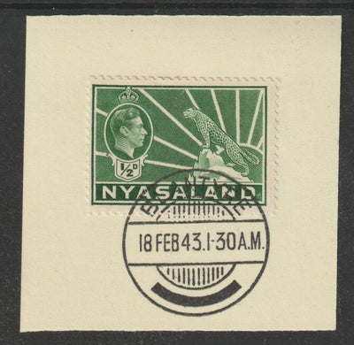 Nyasaland 1938-44 KG6 Leopard Symbol 1/2d green SG 130 on piece with full strike of Madame Joseph forged postmark type 317