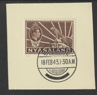 Nyasaland 1938-44 KG6 Leopard Symbol 1/2d brown SG 130a on piece with full strike of Madame Joseph forged postmark type 317