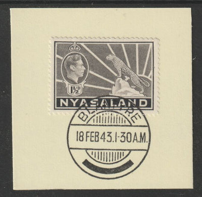 Nyasaland 1938-44 KG6 Leopard Symbol 1.5d grey SG 132a on piece with full strike of Madame Joseph forged postmark type 317