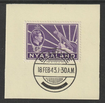 Nyasaland 1938-44 KG6 Leopard Symbol 6d violet SG 136 on piece with full strike of Madame Joseph forged postmark type 317