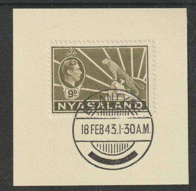 Nyasaland 1938-44 KG6 Leopard Symbol 9d olive-bistre SG 137 on piece with full strike of Madame Joseph forged postmark type 317