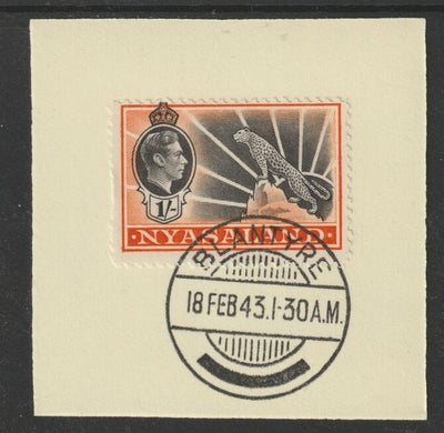 Nyasaland 1938-44 KG6 Leopard Symbol 1s black & orange SG 138 on piece with full strike of Madame Joseph forged postmark type 317