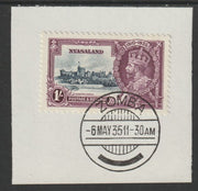 Nyasaland 1935 KG5 Silver Jubilee 1s (SG 126) on piece with full strike of Madame Joseph forged postmark type 314 (First day of issue)