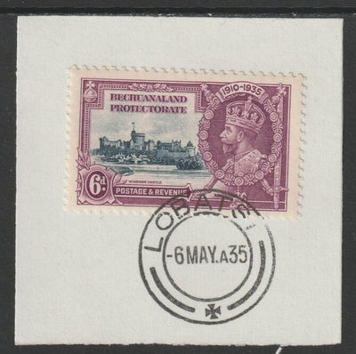 Bechuanaland 1935 KG5 Silver Jubilee 6d (SG 114) on piece with full strike of Madame Joseph forged postmark type 55 (First day of issue)