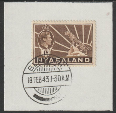 Nyasaland 1938-44 KG6 Leopard Symbol 1d brown SG 131 on piece with full strike of Madame Joseph forged postmark type 317