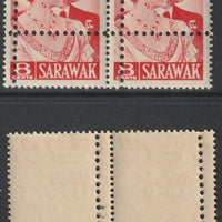 Sarawak 1948 KG6 Royal Silver Wedding 8c horizontal pair with perforations doubled unmounted mint but some foxing. Note: the stamps are genuine but the additional perfs are a slightly different gauge identifying it to be a forgery.