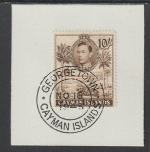 Cayman Islands 1938 KG6 Pictorial def 10s carmine (Schooner) on piece with full strike of Madame Joseph forged postmark type 116 or 118