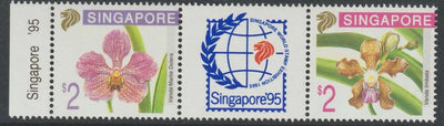 Singapore 1995 Stamp Exhibition - Orchids #5 se-tenant strip of three (2 stamps and one label) unmounted mint as SG 795-96