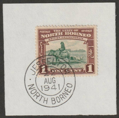 North Borneo 1939 Buffalo Transport 1c on piece with full strike of Madame Joseph forged postmark type 310