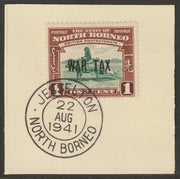 North Borneo 1941 WAR TAX overprinted on Buffalo Transport 1c on piece with full strike of Madame Joseph forged postmark type 310